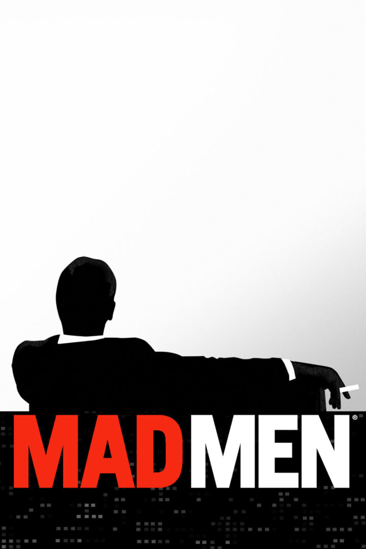 A man sitting on top of a couch with the word " mad men " underneath it.